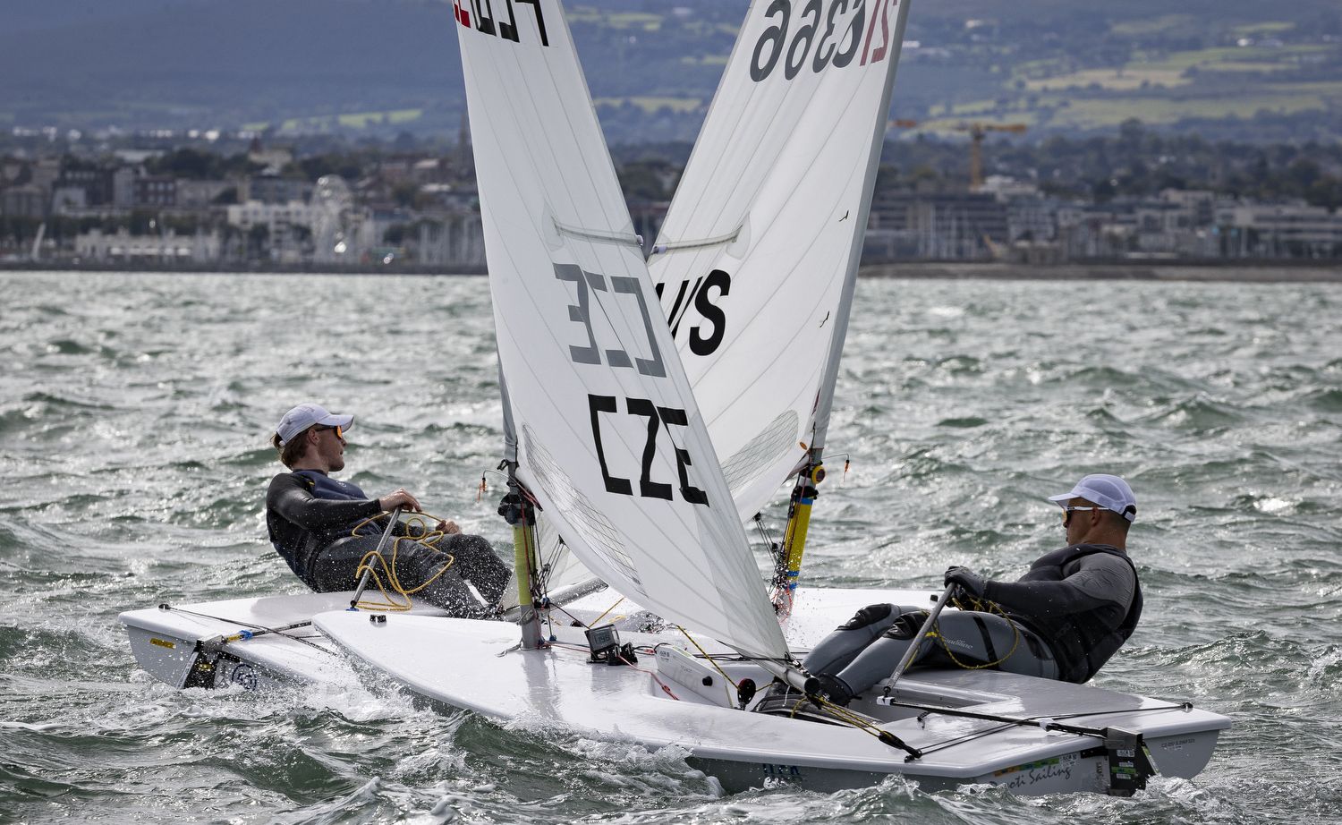 Jan Belik racing close to a US sailor in Dublin Bay