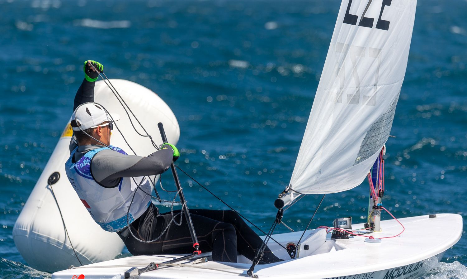 Jan Belik rounding a mark at the 2024 ILCA U21 Worlds